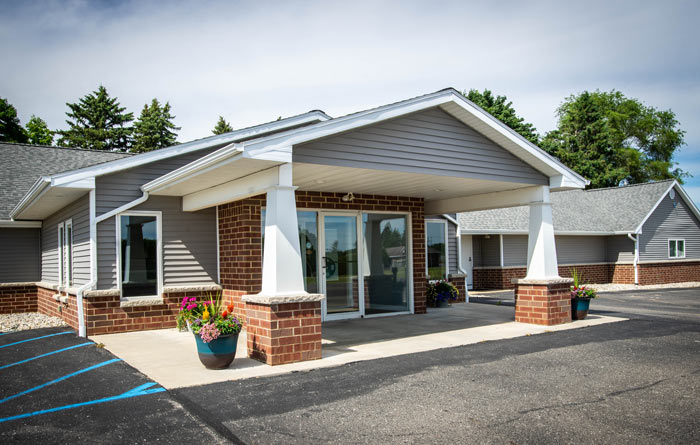 a photo of the exterior of the Pleasant Optics office